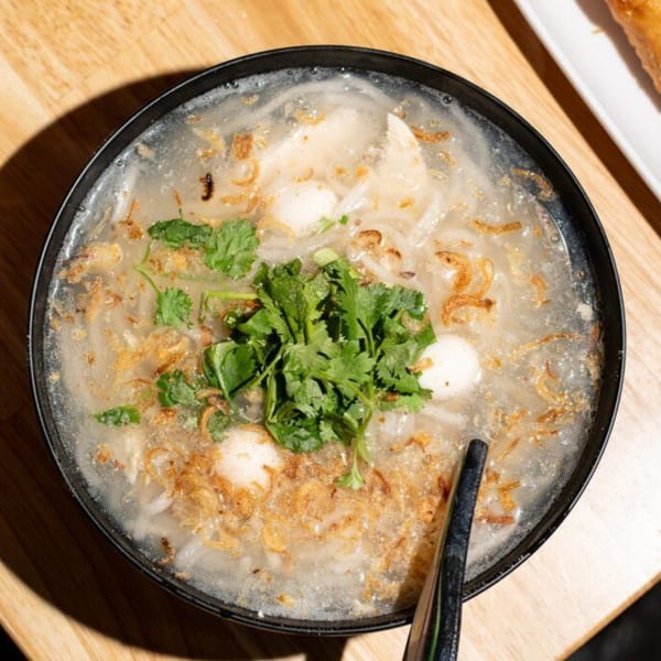 Kin Dee Thai's clear noodle soup with fish balls, fried garlic, and fresh cilantro.